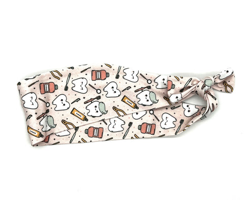 Teeth and Dental Tools on Pink Headband