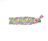 Colorful Lucky Charms Cereal headband with rainbows and sharmocks on a white background
