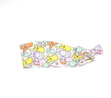 Headband with colorful Peeps marshmallow pattern on a white background