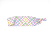 Pastel checkered headband on a white background